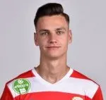 K. Korbély
